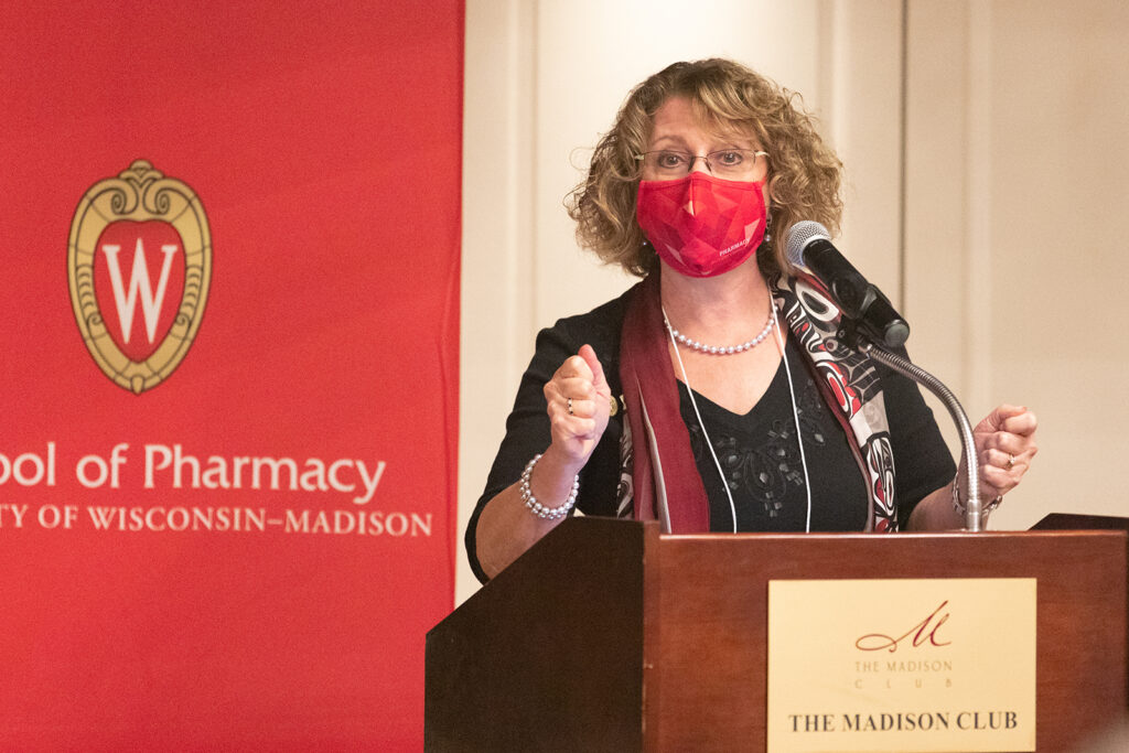 Jayne Hastedt speaking at the podium