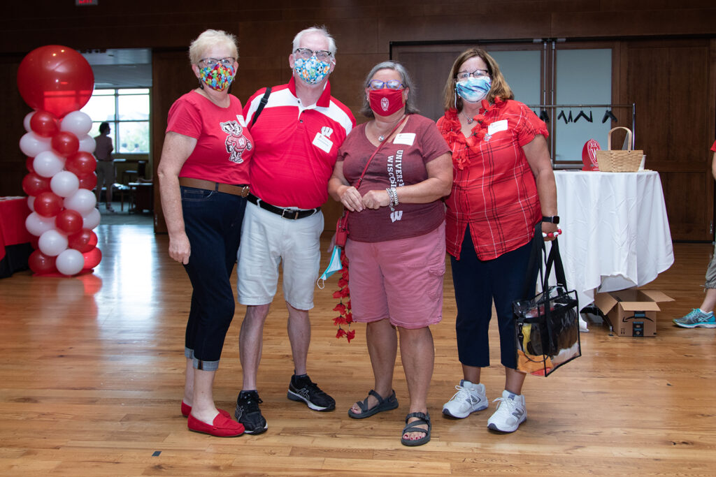 School of Pharmacy Alumni Tailgate Party 2021 Pharmacy alumni wearing red together at event