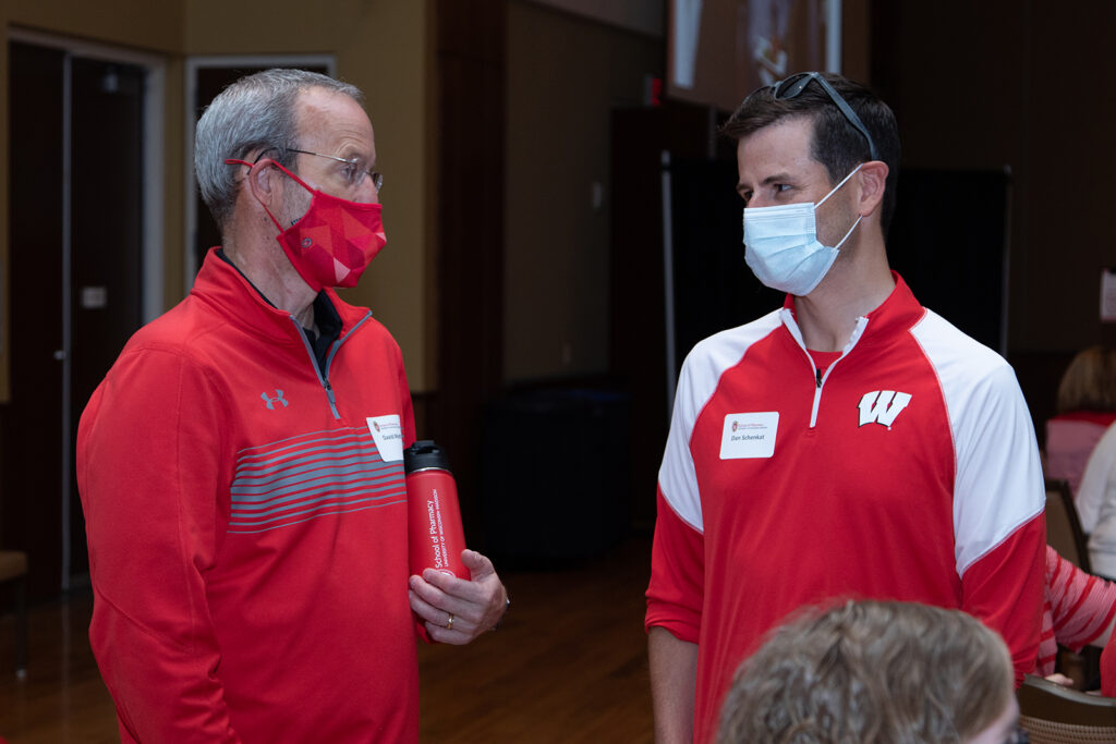 School of Pharmacy Alumni Tailgate Party 2021 Dave Mott and Dan Schenkat together at alumni event