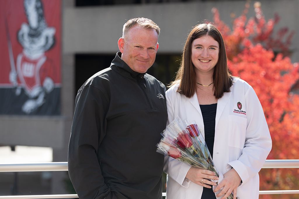 A group of students pose outside after the 2022 White Coat Ceremony.
