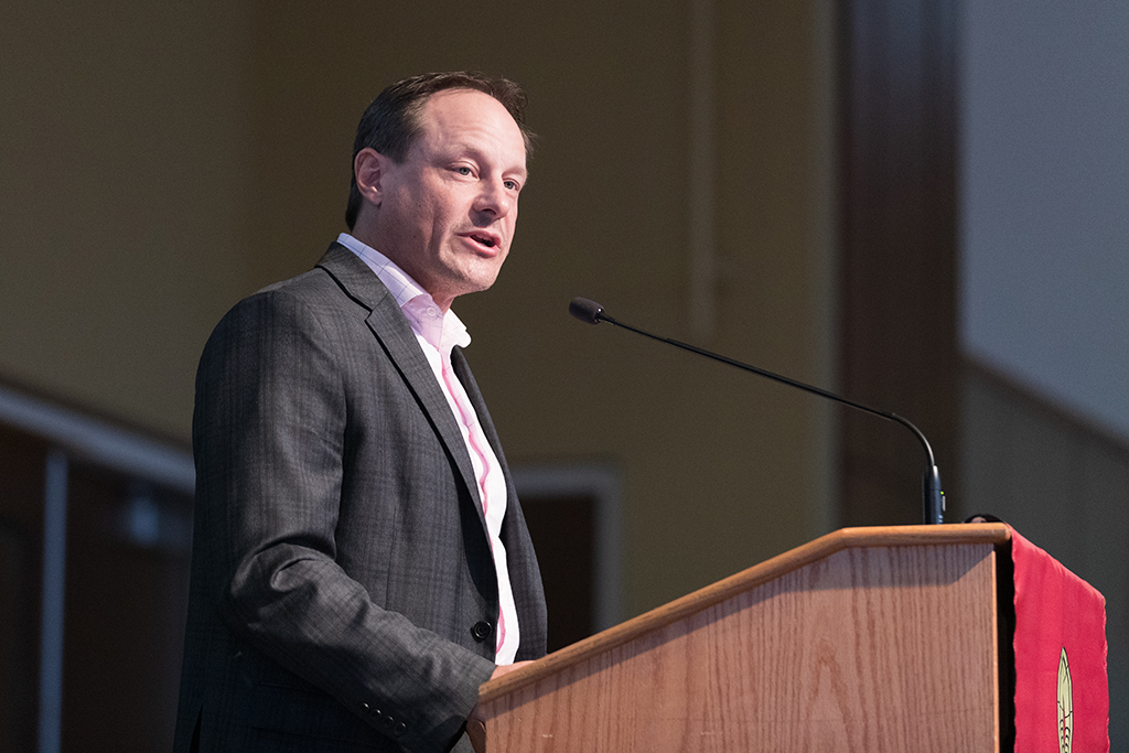 Jason Lau speaks during the 2022 White Coat Ceremony.
