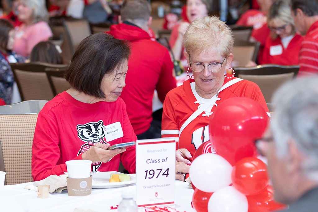 UW–Madison School of Pharmacy 2024 Alumni Tailgate and Watch Party Pauline Chan speaks with Mary Ann Kennedy