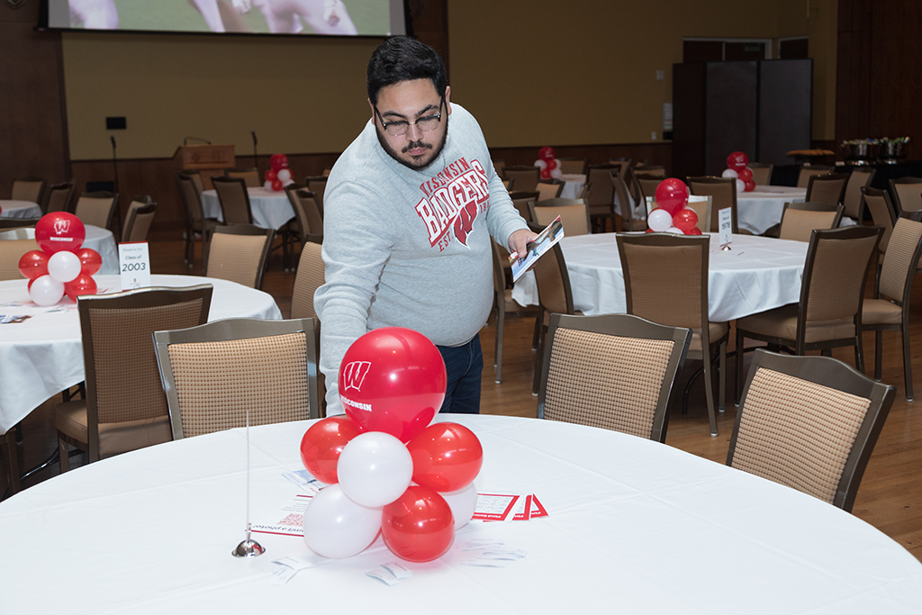 School of Pharmacy Alumni Tailgate Party 2023 Staff setting up tables for event