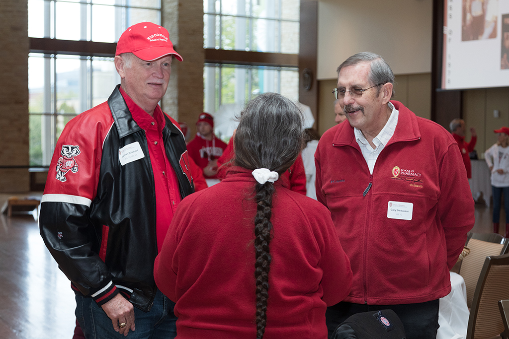 School of Pharmacy Alumni Tailgate Party 2023 Alumni talking together