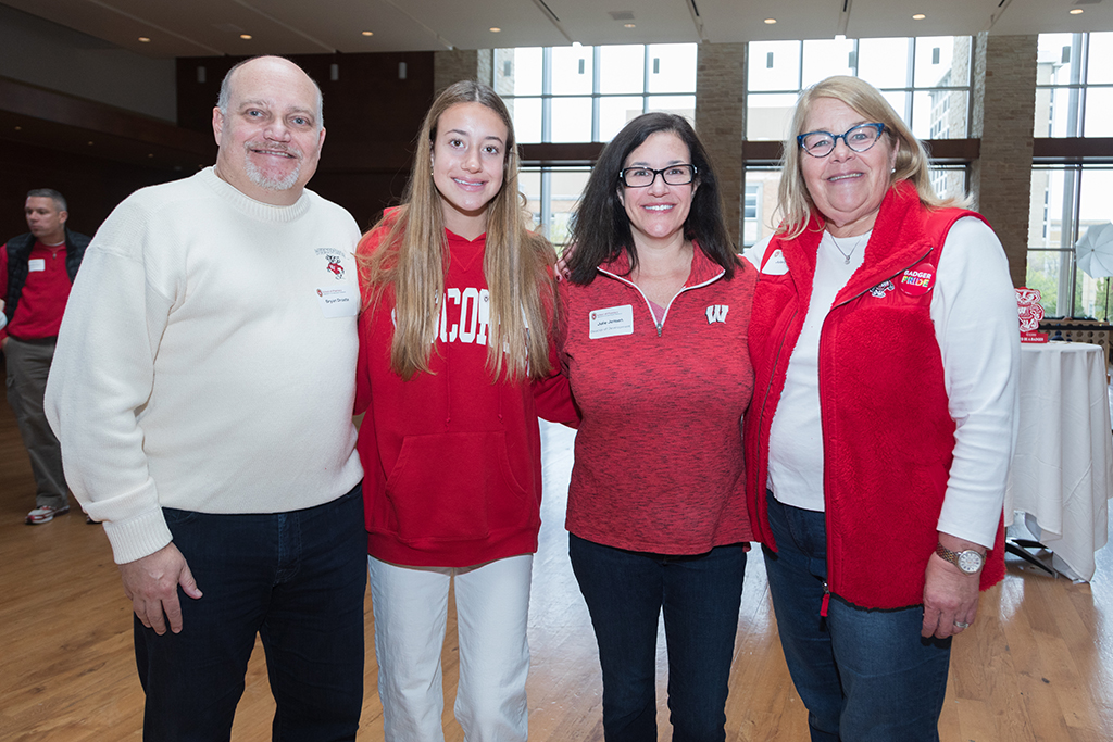 School of Pharmacy Alumni Tailgate Party 2023 Alumni wearing badger gear together