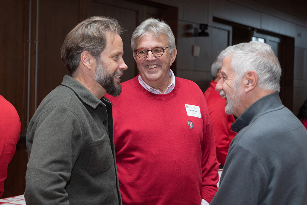 School of Pharmacy Alumni Tailgate Party 2023 Alumni laughing together