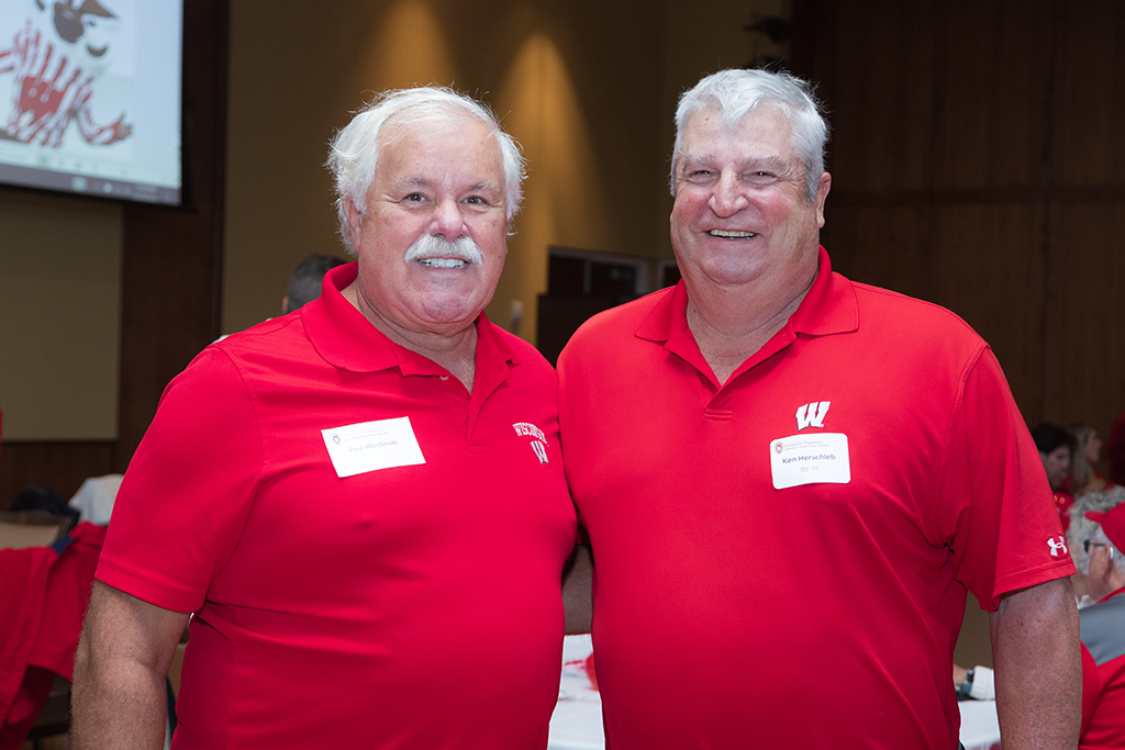 School of Pharmacy Alumni Tailgate Party 2023 Two alumni smiling for the camera together