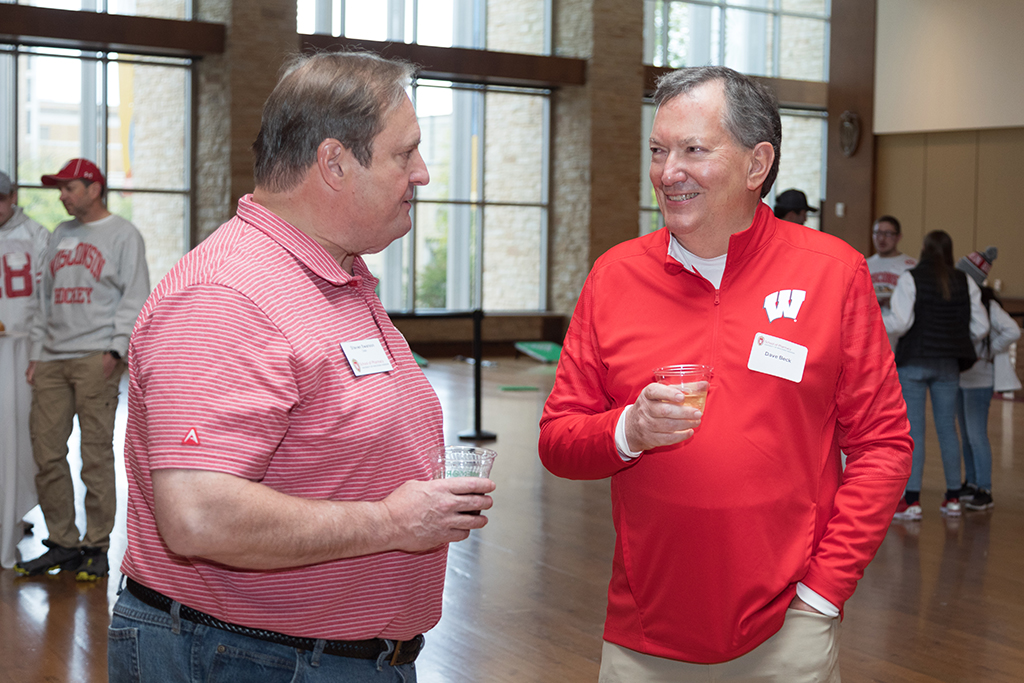 School of Pharmacy Alumni Tailgate Party 2023 Dean Steve Swanson speaking with alumni