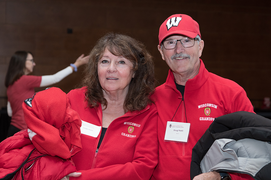 School of Pharmacy Alumni Tailgate Party 2023 Alumni Doug Hoelz smiling with his wife Linda