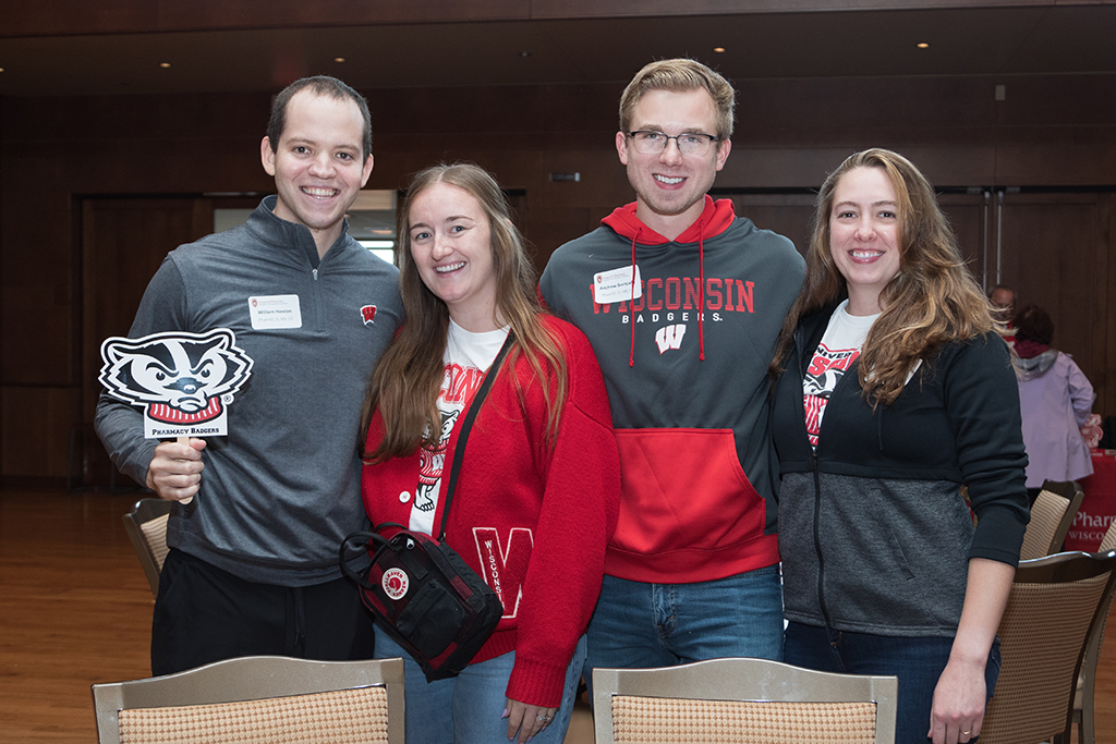 School of Pharmacy Alumni Tailgate Party 2023 Alumni smiling for the camera