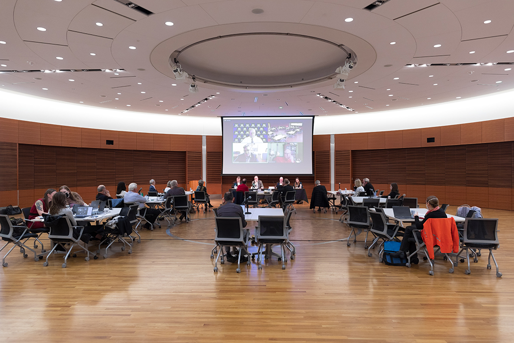UW–Madison School of Pharmacy Board of Visitors Meeting 2022 A group of Board of Visitors members and other School of Pharmacy members watching the panel discussion.