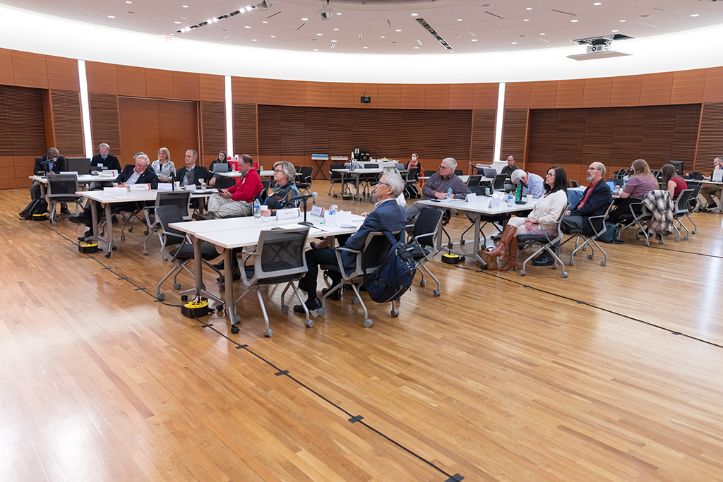 UW–Madison School of Pharmacy Board of Visitors Meeting 2022 A group of Board of Visitors members and other School of Pharmacy members watching the panel discussion.