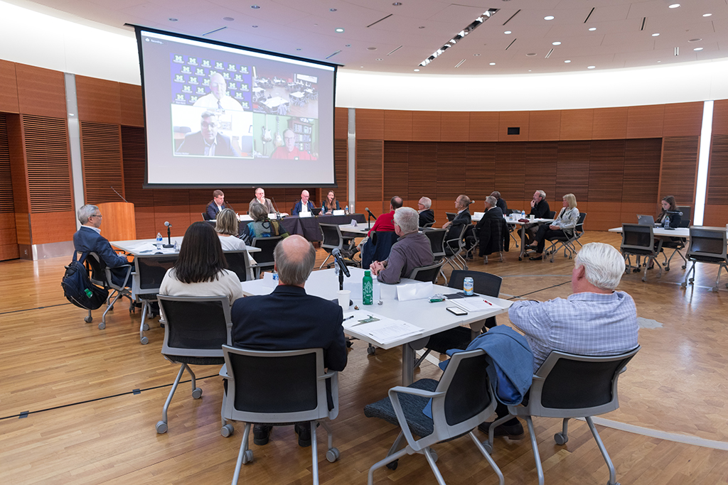 UW–Madison School of Pharmacy Board of Visitors Meeting 2022 A group of Board of Visitors members and other School of Pharmacy members watching the panel discussion.