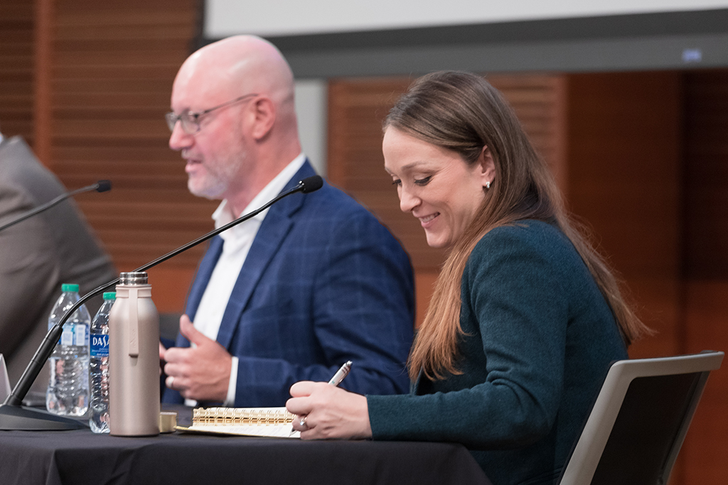 UW–Madison School of Pharmacy Board of Visitors Meeting 2022 Kristin Tiry speaks during the panel discussion, next to Steve Rough