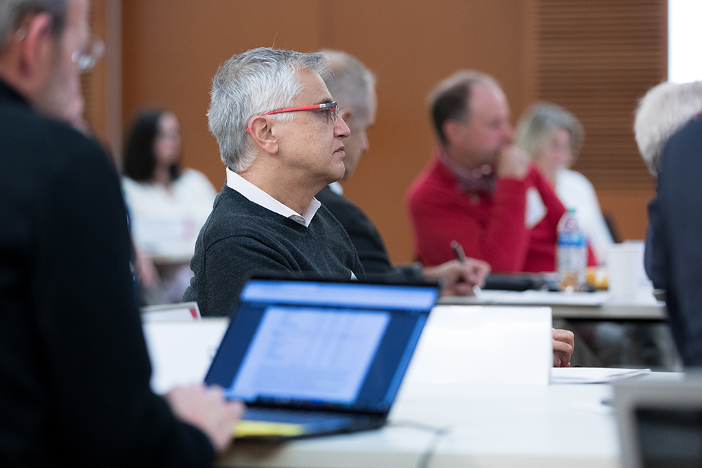 UW–Madison School of Pharmacy Board of Visitors Meeting 2022 Mehran Yazdanian and others listen to the panel discussion.