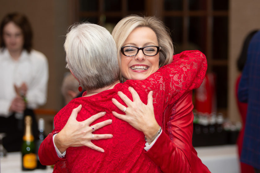 phar110819_064 Staff hugging at Citations of merit dinner