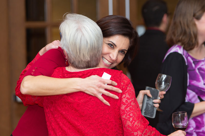 phar110819_065 Staff hugging at Citations of merit dinner