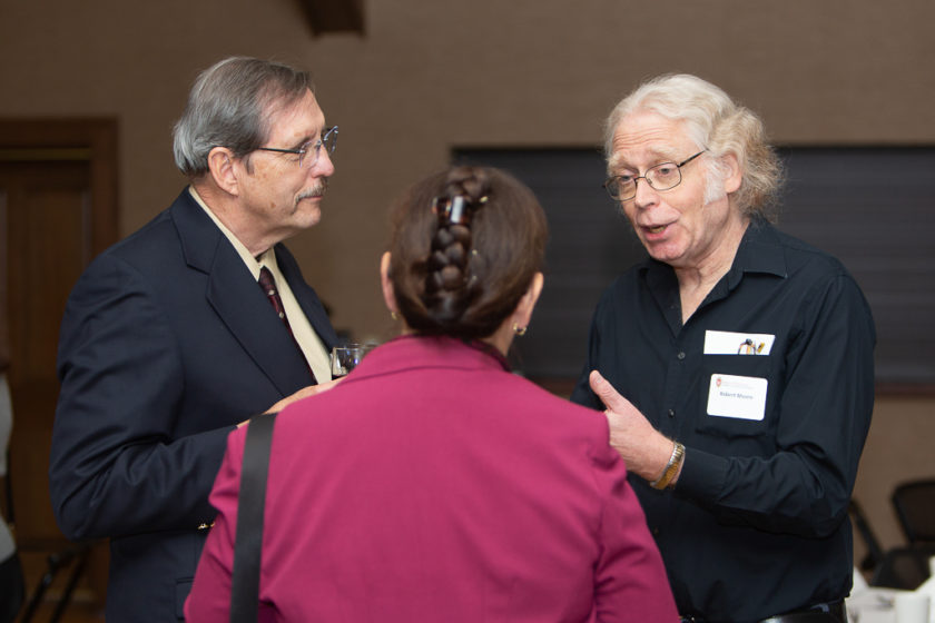 phar110819_089 Staff talking at Citations of merit dinner