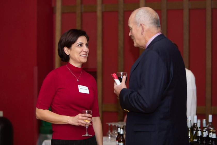 phar110819_117 Staff talking together at Citations of Merit dinner