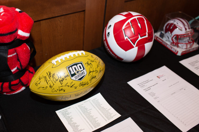 phar110919_062 Signed balls for silent auction at Alumni Tailgate and Viewing party