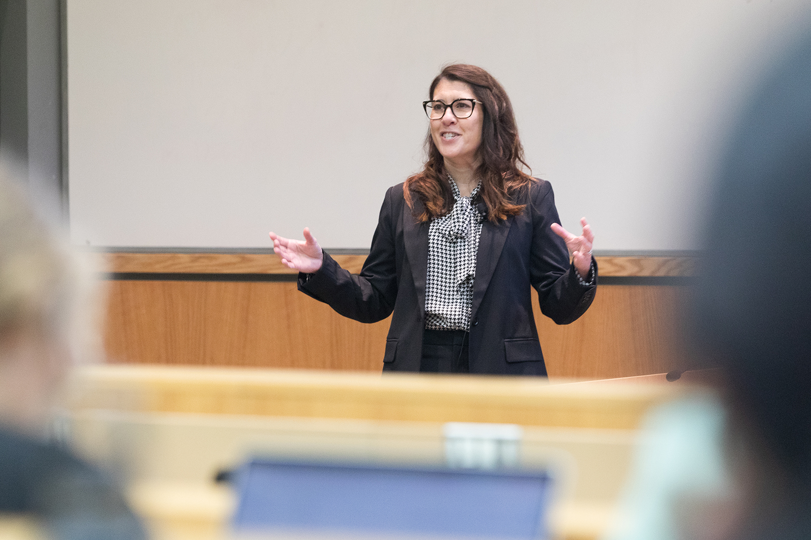 Lisa Imhoff speaking and gesturing with her hands.