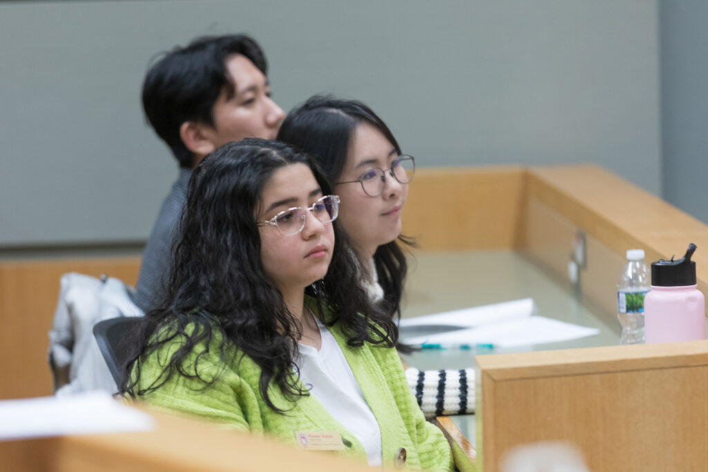 SoP Lecture: Cultivating Belonging in Pharmacy (December 1, 2023) PharmD students listen to the keynote speech during the DiveRxsity Dialogues event.