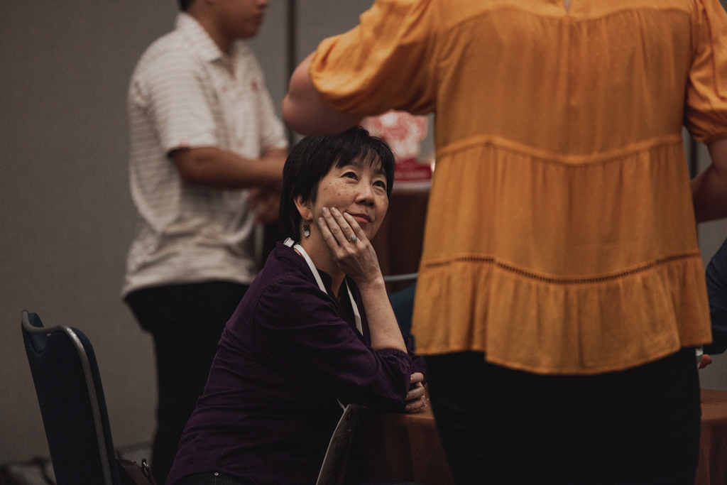 pharma0225_ Michelle Chui watches an attendee speak