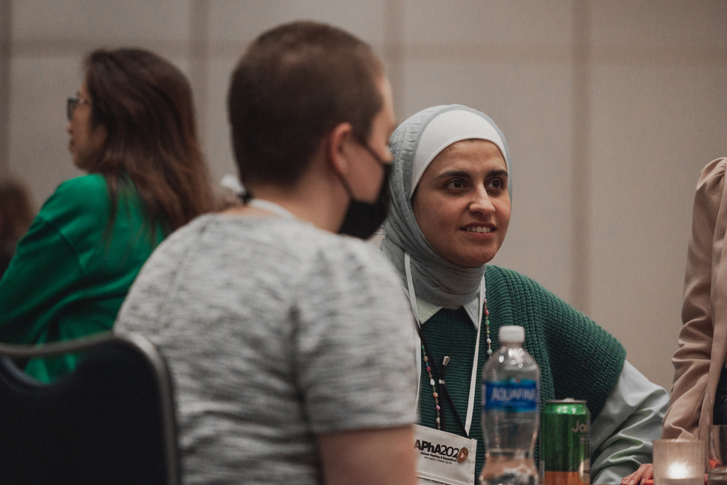 pharma0541_ Sura AlMahasis speaks with an attendee