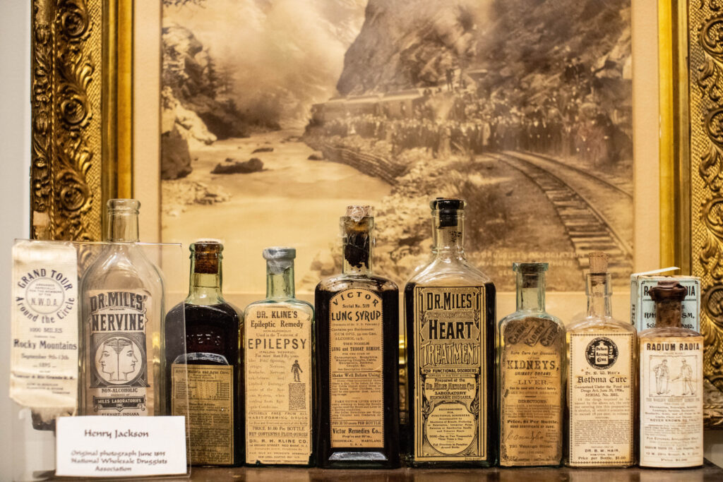 real-life-photographs-32 Glass jars featuring worn labels saying, "Dr. Miles' Nervine," "Dr. Kline's Epilepsy Remedy," "Victor Lung Syrup," "Dr. Miles' Heart Treatment," "Asthma Care," and "Radium Radia."