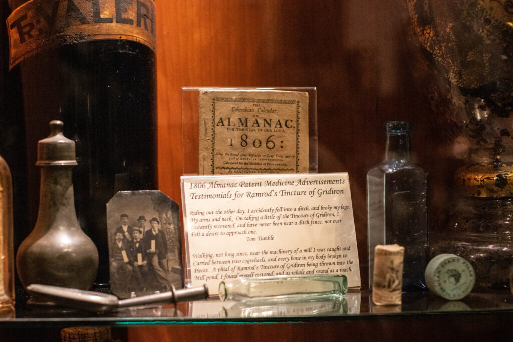 real-life-photographs-38 A display featuring a label saying "1806 Almanac Patent Medicine Advertisements Testimonials for Ramrod's Tincture of Gridiron."