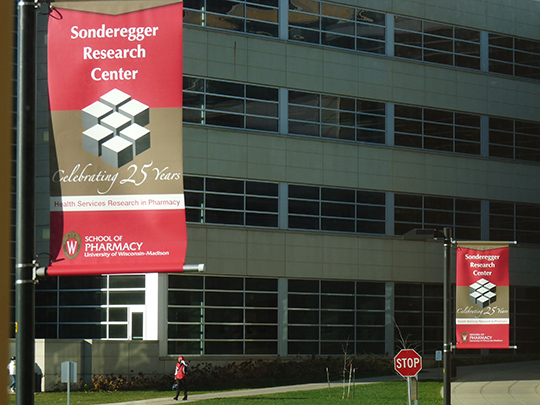 A banner celebrating the SRC's 25th anniversary hangs outside of Rennebohm Hall