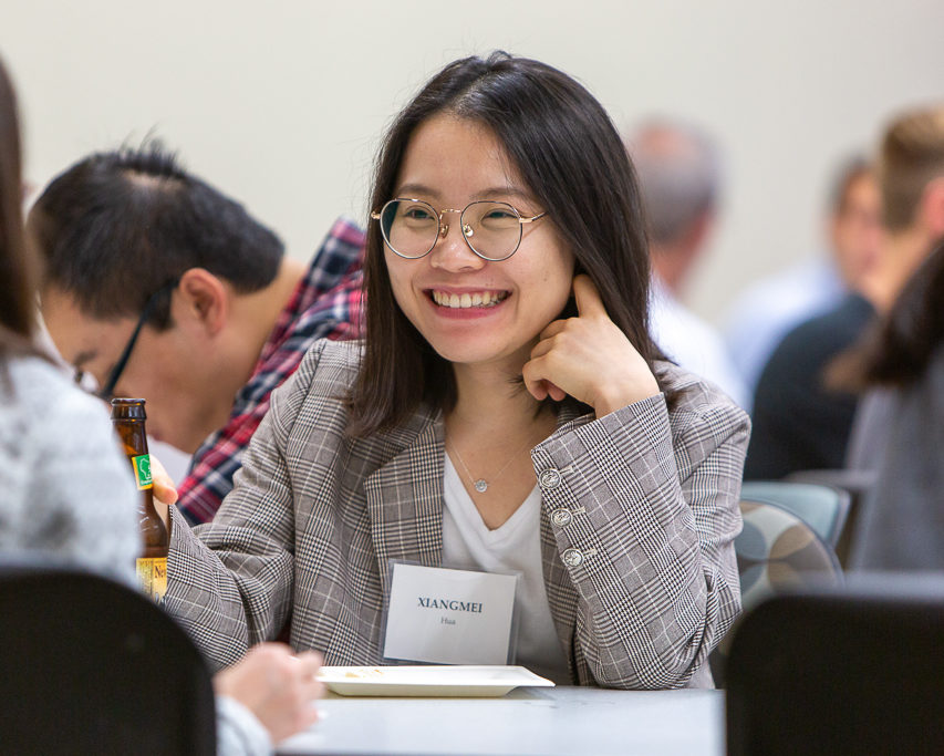 sop092719_022 Event attendee smiling at table